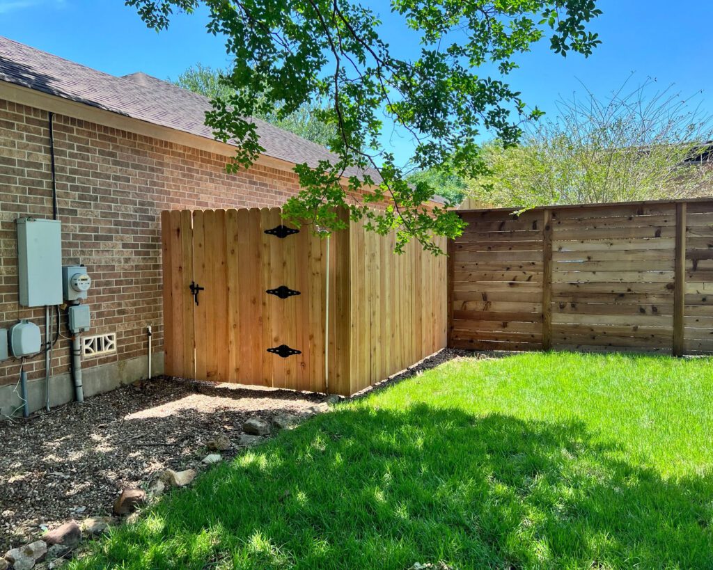Custom cedar gate for Austin privacy fencing Wood privacy gate with black hinges in Austin