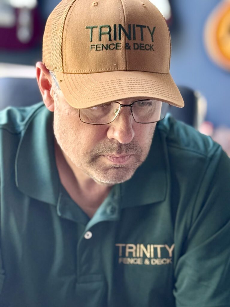 Owner Neil Kreitzer reviewing a quote before sending it to a potential customer.