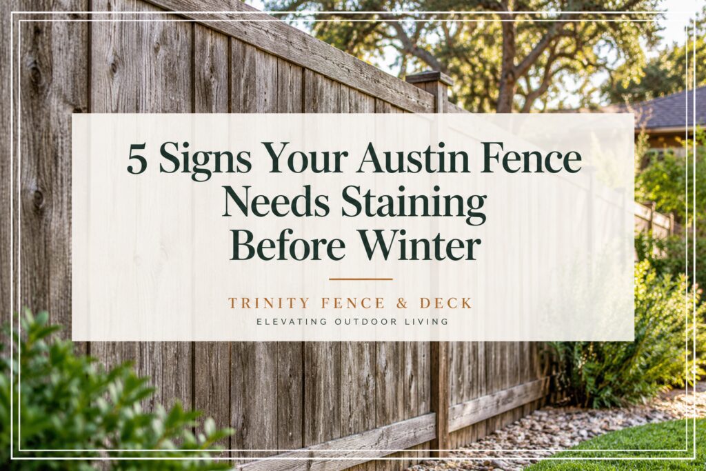 Weathered cedar privacy fence with faded boards showing signs of needing stain in Austin